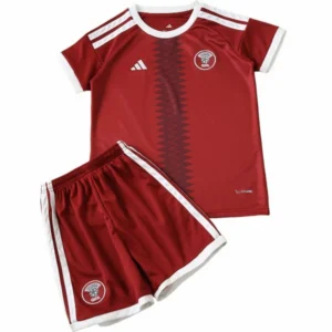 Catar Niños Conjunto 2026 Casa Rojo - Catar Niños Barata | tiendasdefutboles