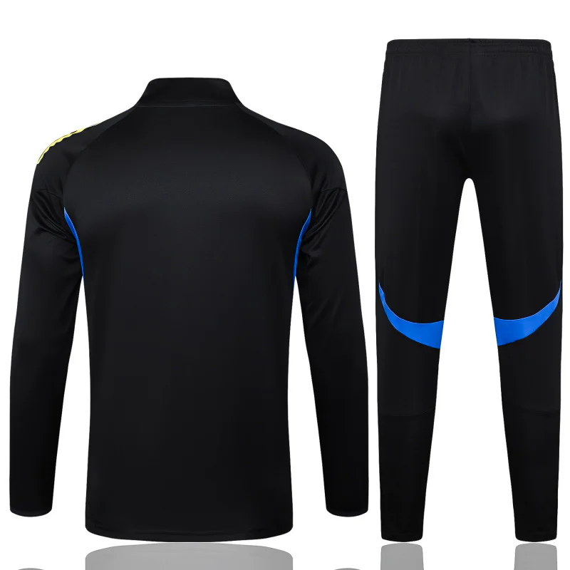 Conjunto Completo Sudadera Entrenamiento Manchester United 2025 2026 Negro Amarillo Manchester United Conjunto 2025 2026 Negro - Maglia Manchester United | tiendasdefutboles