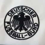 Rompevientos Alemania 2026 Blanco I Rojo