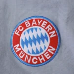 Rompevientos Bayern Múnich 2025 2026 Gris