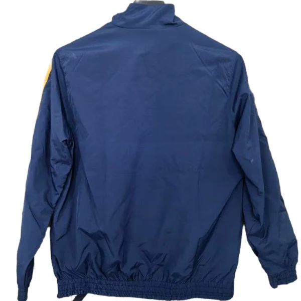 Rompevientos Real Madrid 2025 2026 Azul Amarillo Real Madrid Rompevientos 2025 2026 Azul - Maglia Real Madrid | tiendasdefutboles